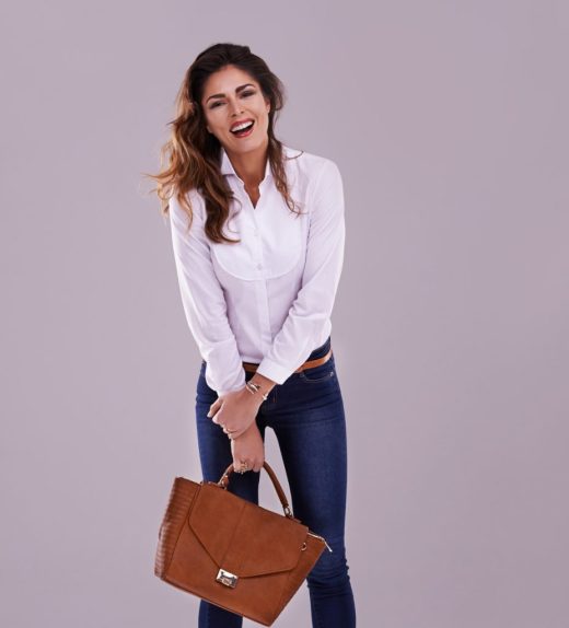 stylish-woman-golding-brown-bag